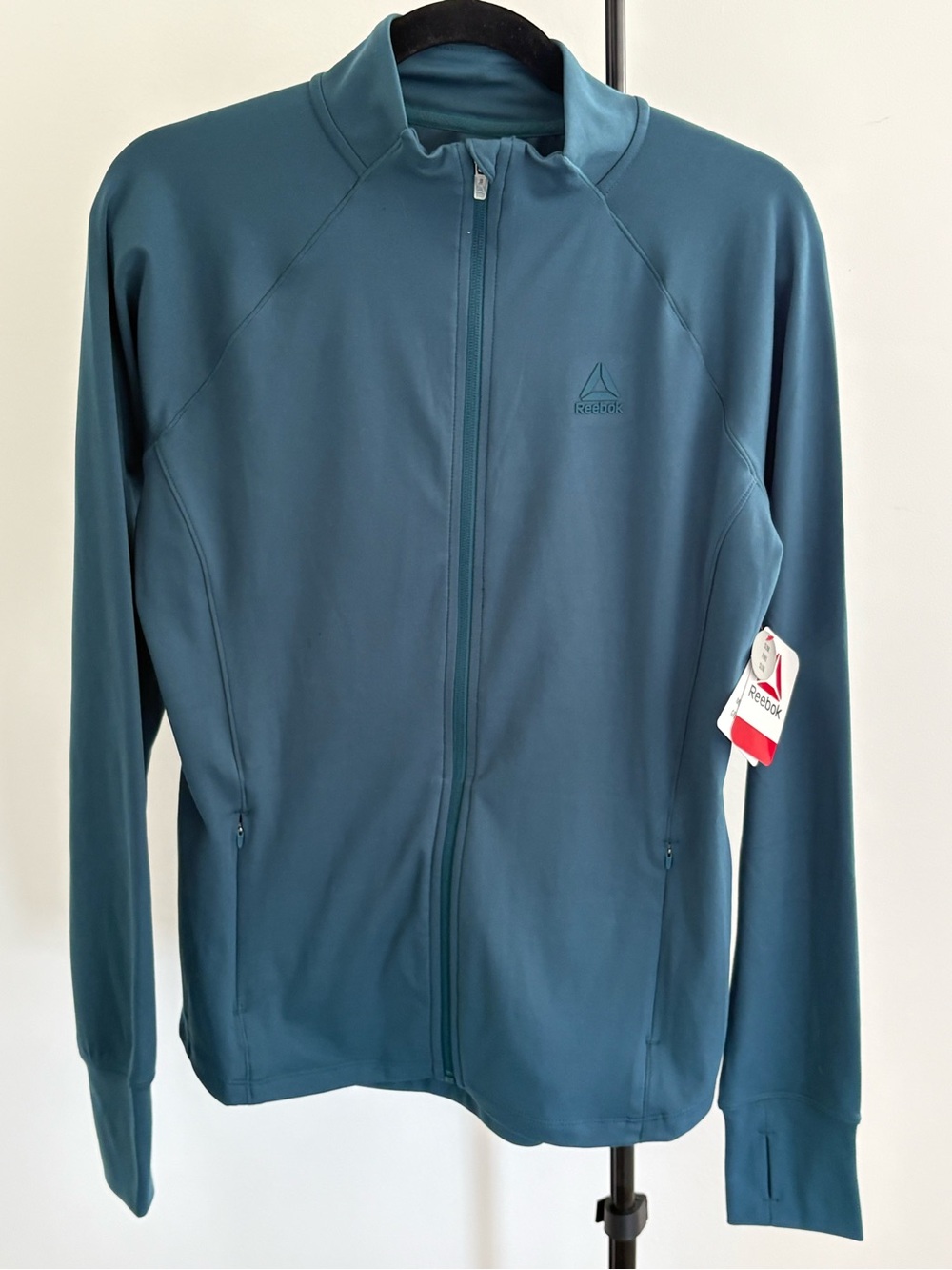 Reebok Women’s Teal Full-Zip Performance Jacket with Subtle Logo